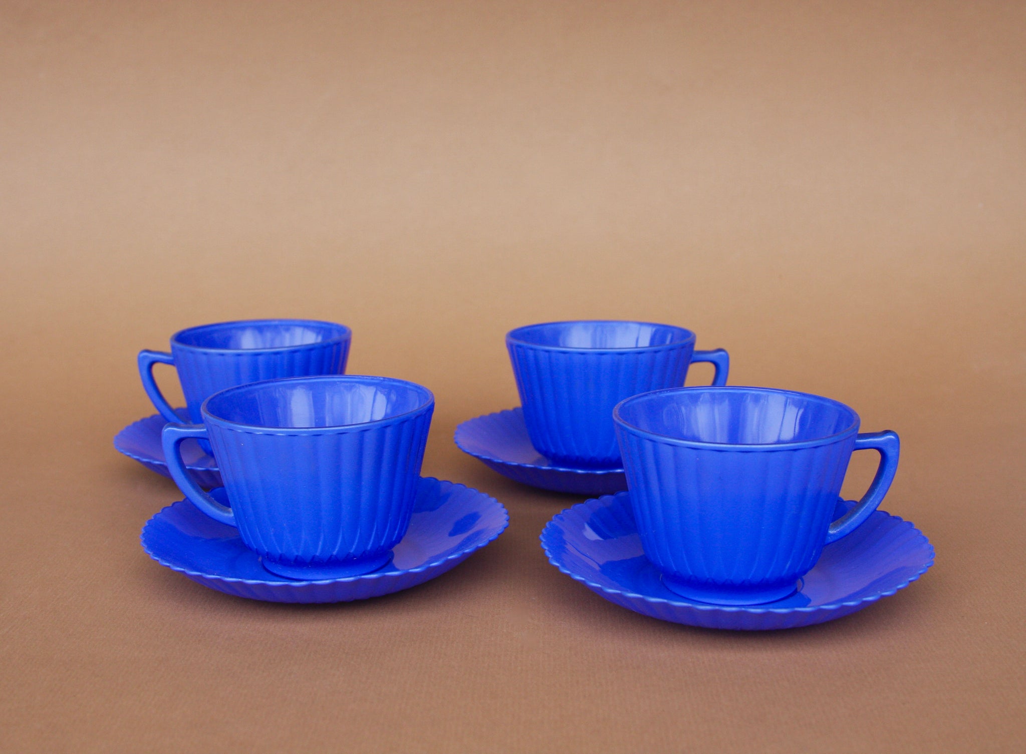 Set of Four Tea / Coffee Cups and Saucer Set