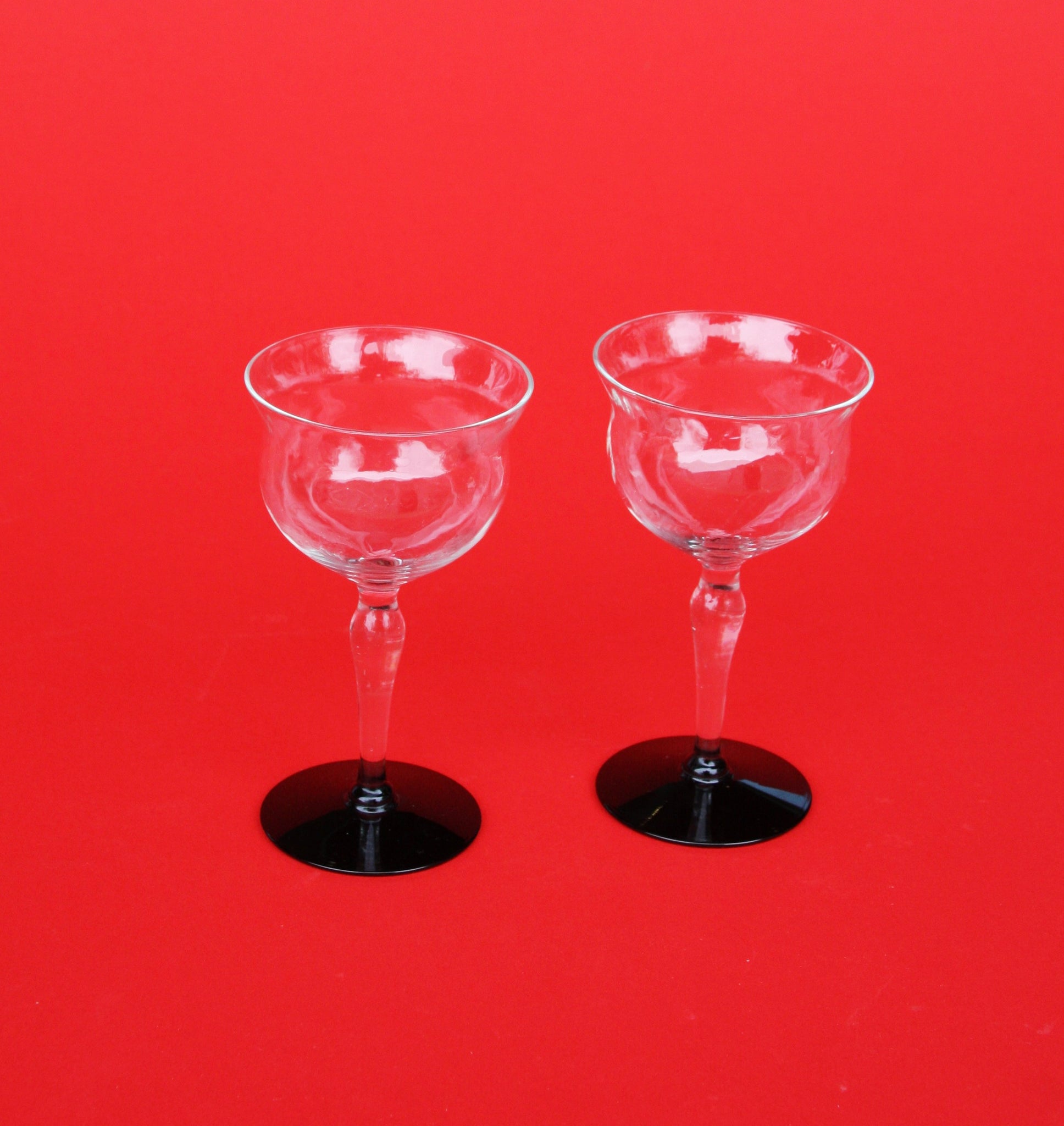 Vintage Pair of Black Base Glass Coupes