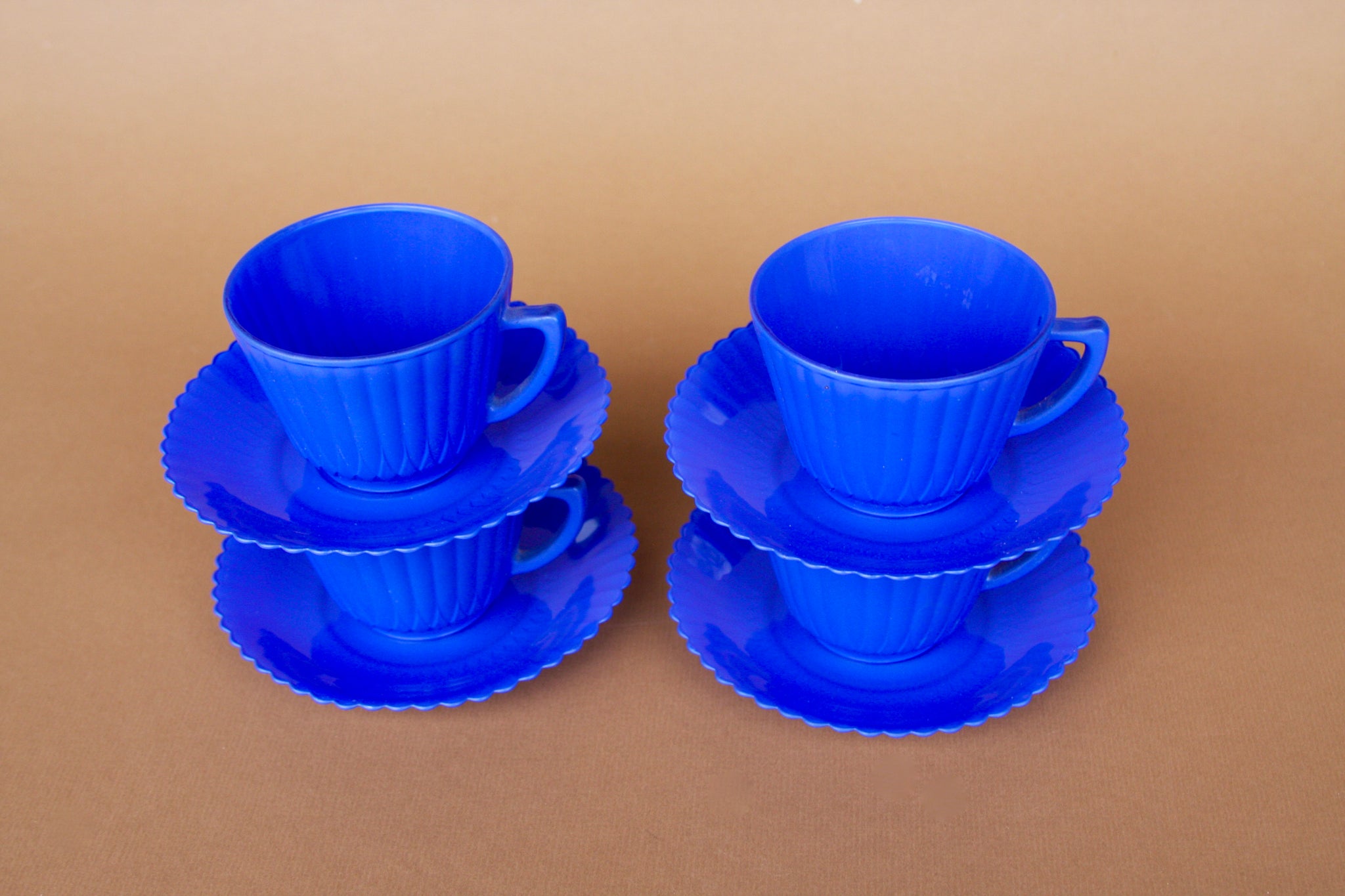 Set of Four Tea / Coffee Cups and Saucer Set